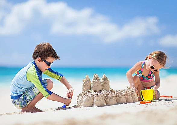 kids building a sandcastle