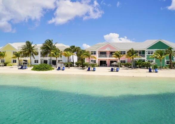 a row of houses on a beach