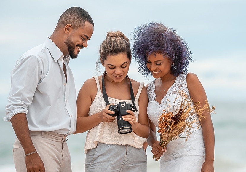 a group of people looking at a camera