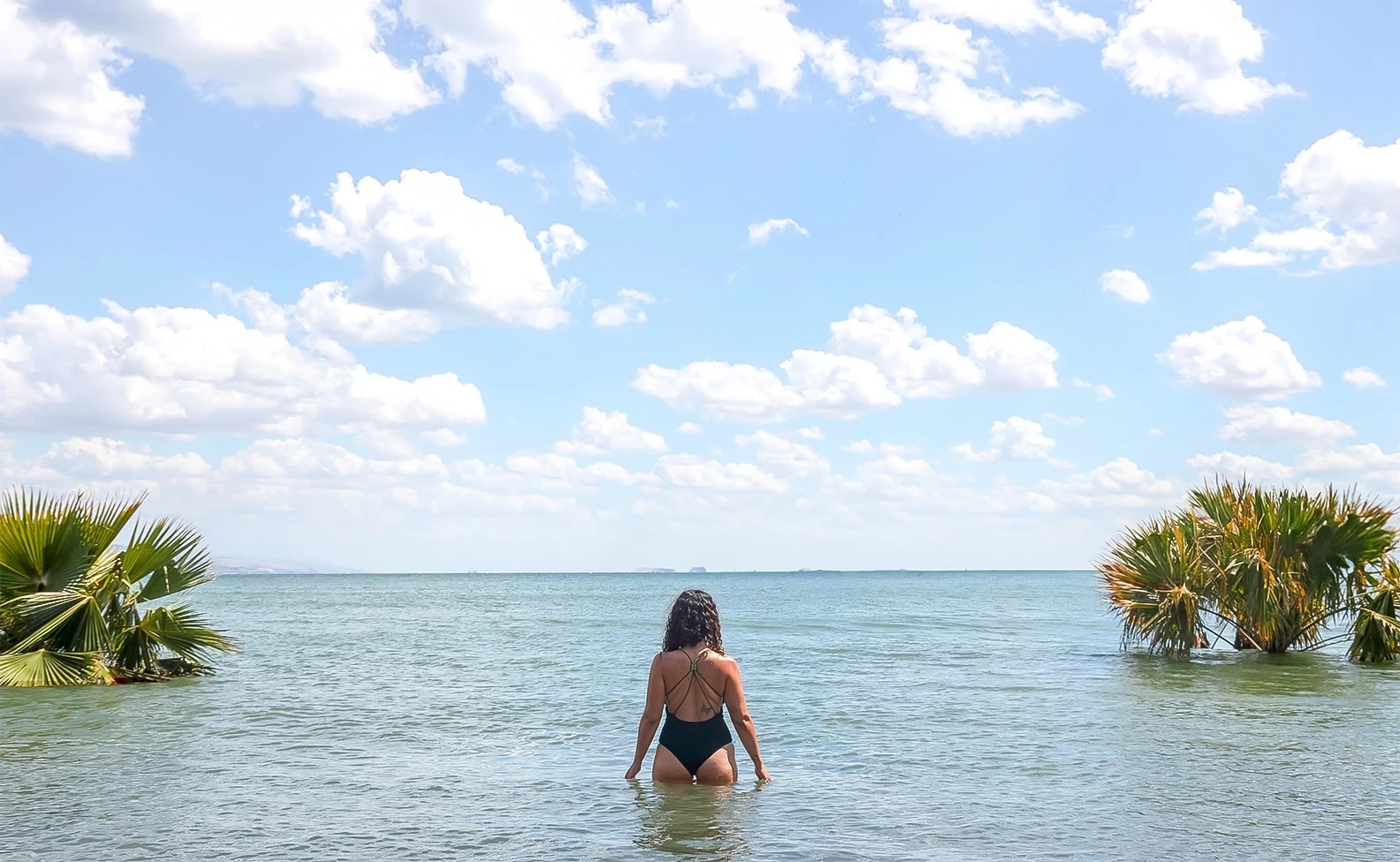 a woman standing in the water
