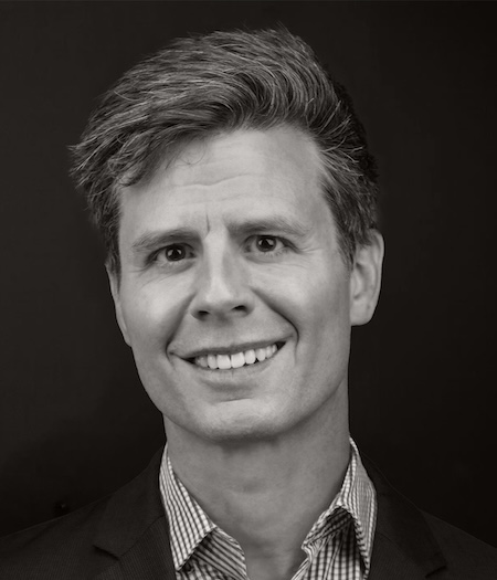 a man smiling for a picture