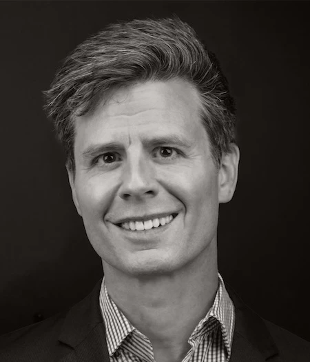 a man smiling for a picture