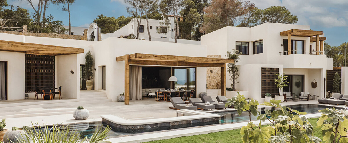 a house with a pool and a patio