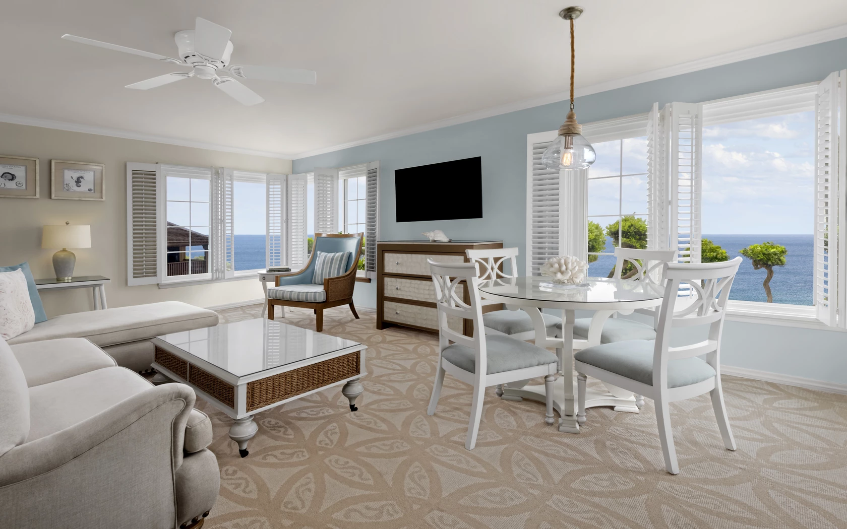 a living room with a television and a table