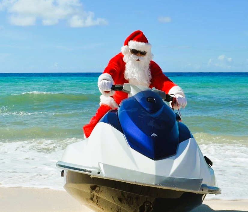 Santa on a jet ski at Sea Breeze Beach House