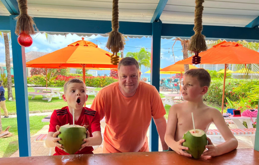 Drinking coconuts at Sea Breeze Beach House