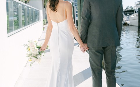 a man and woman holding hands
