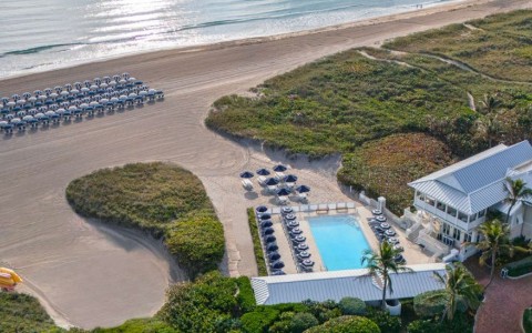 a swimming pool on a beach