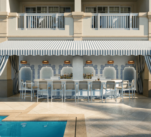 a pool with a table and chairs