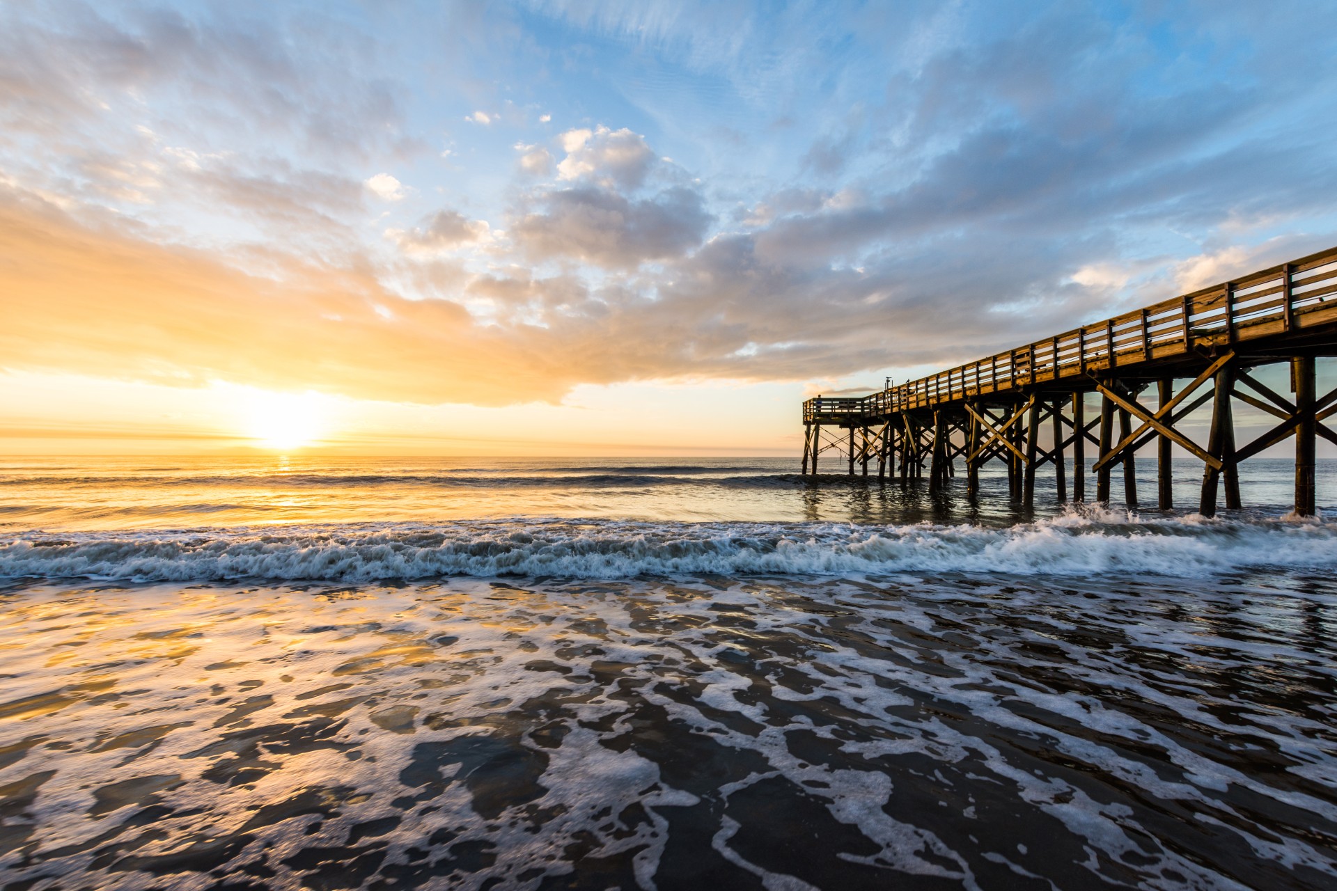a pier on a beach