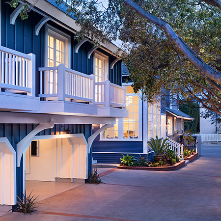 a house with a tree in the front