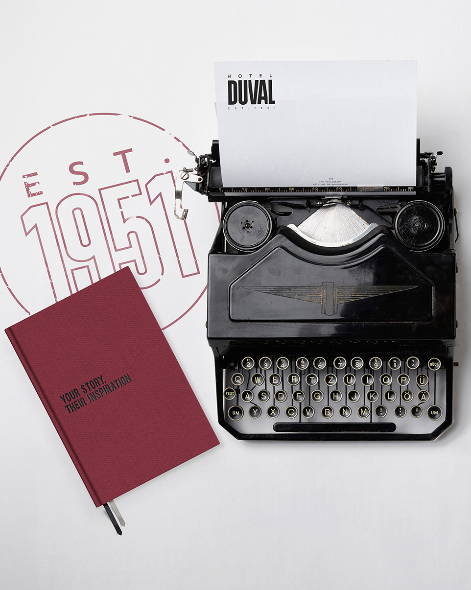 a typewriter and a book