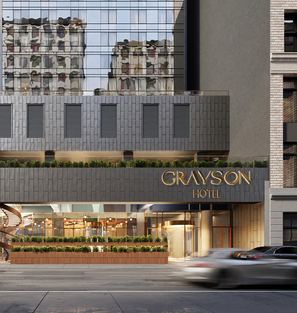 a car driving past a hotel