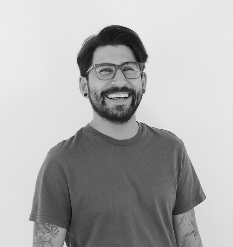 a man with beard and mustache wearing glasses