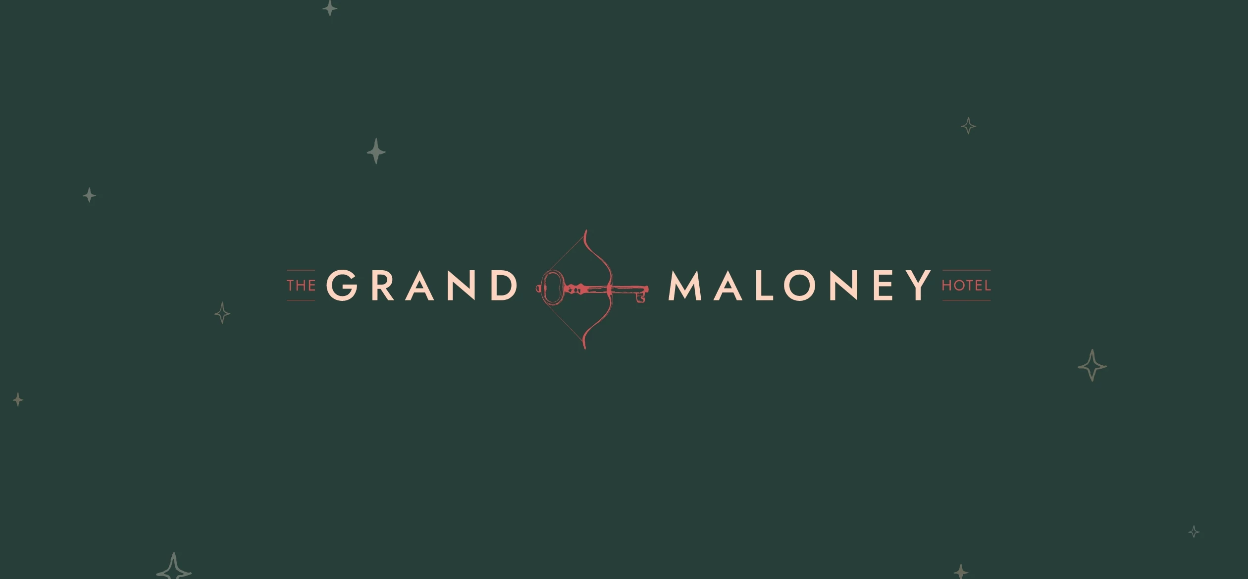 The Grand Maloney Hotel logo on a green background
