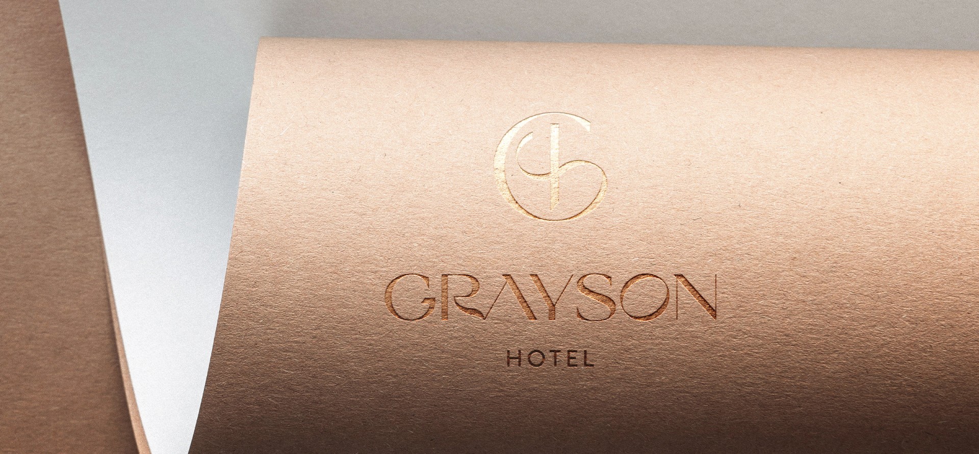 Paper Embossed with the Hotel Grayson logo
