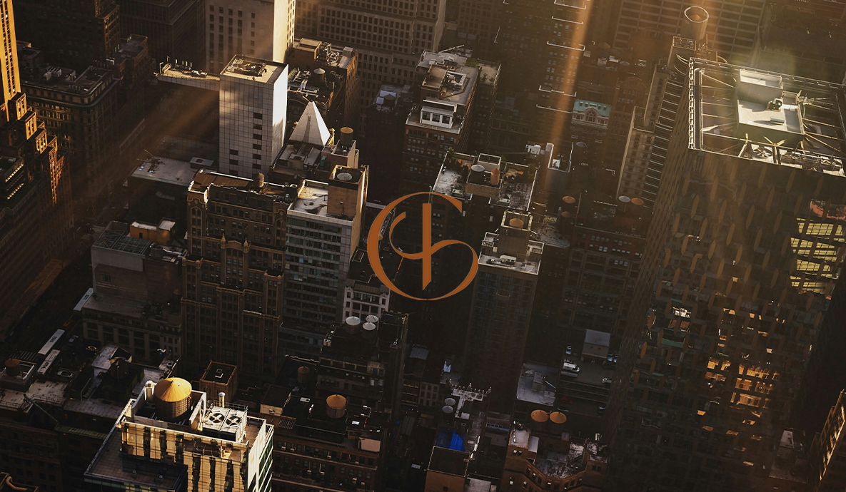 a high angle view of a city with the hotel grayson logo on top