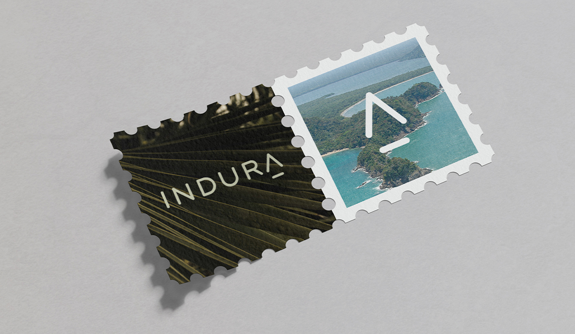 a stamp with a picture of an island and the Indura logo and a stamp with a picture of a leaf with the indura logo