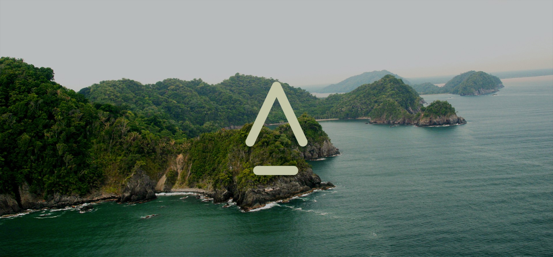 an island surrounded by water with the Indura logo on it