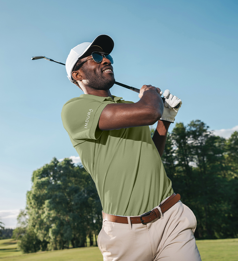 a man swinging a golf club