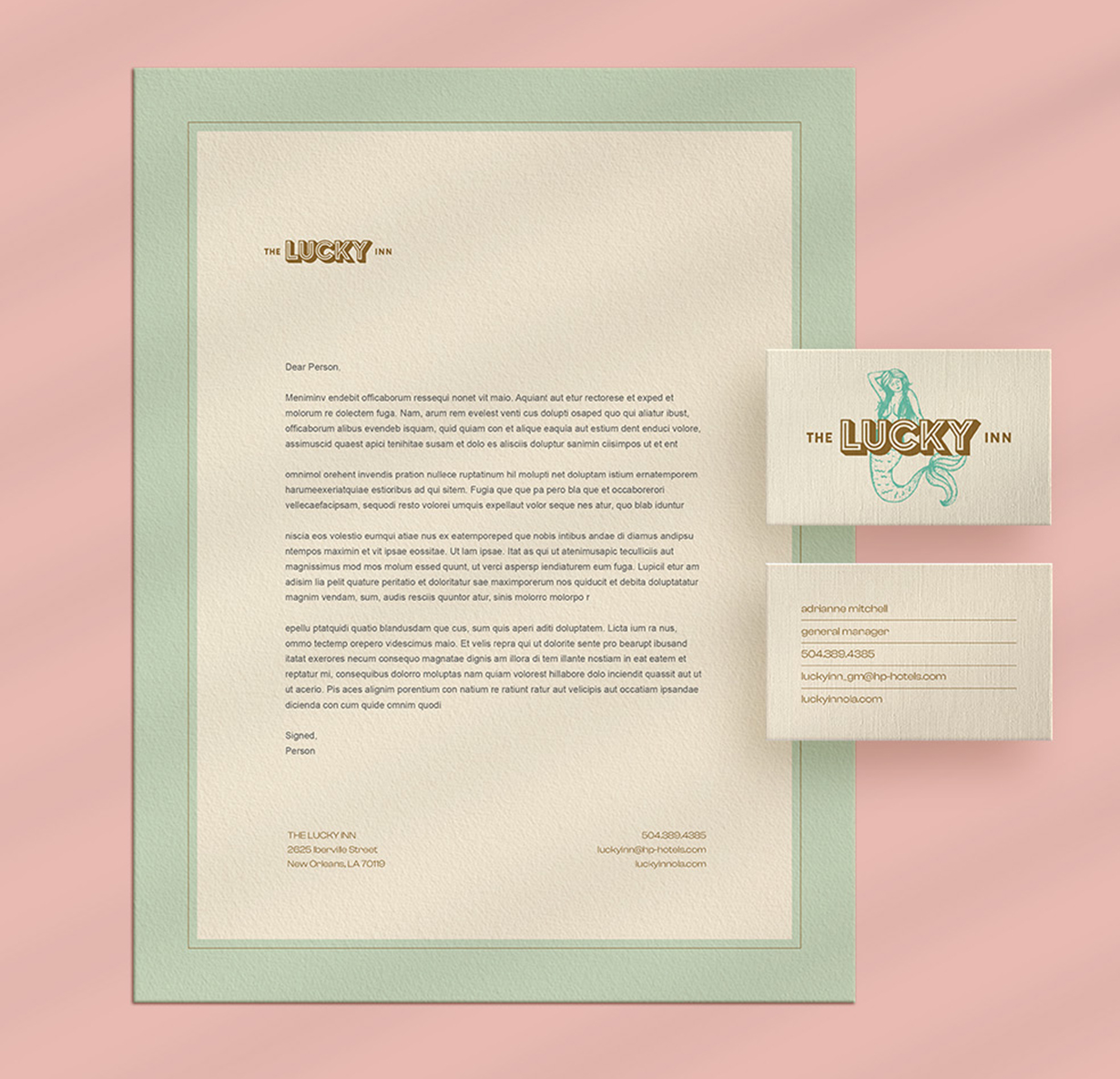 a letterhead and business card with The Lucky Inn branding & logo