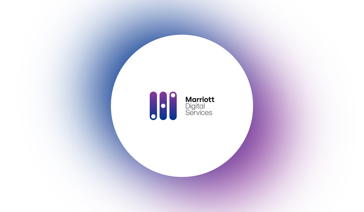 a white circle with the Marriott Digital Services logo in the middle