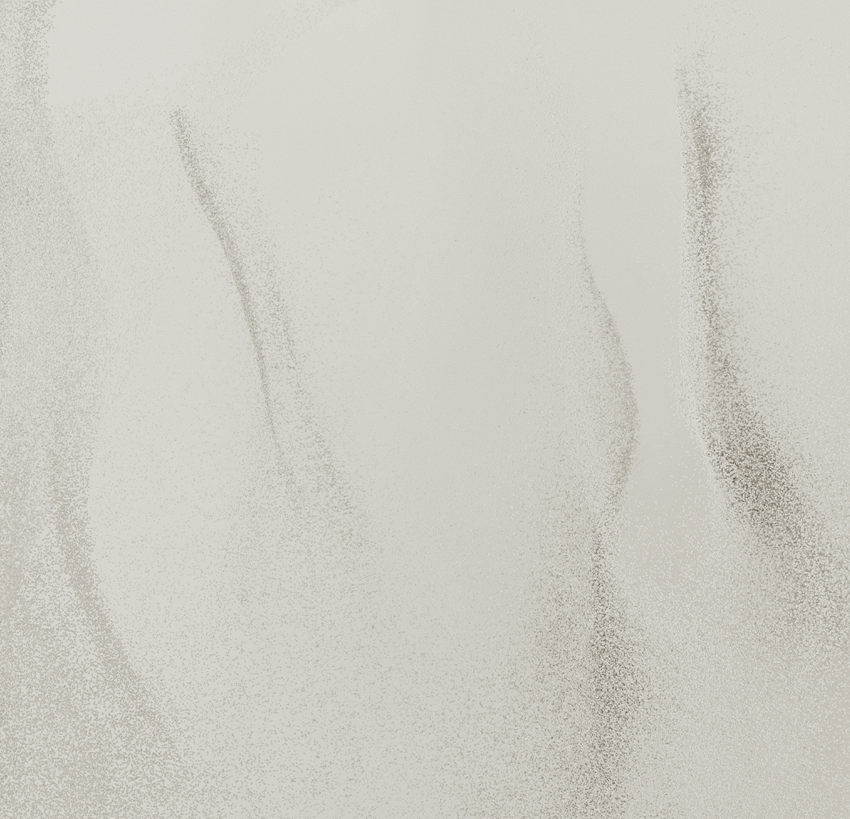 a white surface with small dots