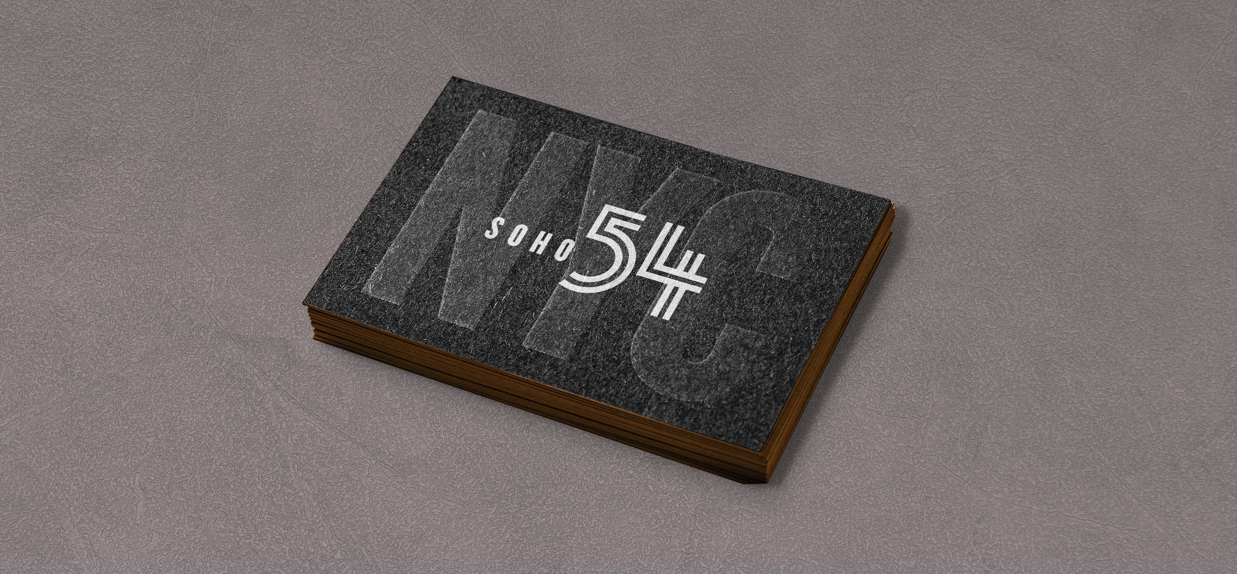 a black and white book that has Soho 54 overlaid