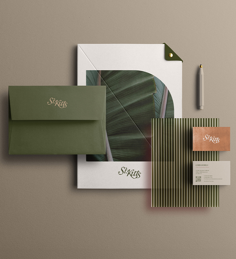 a group of stationery items with the st. kitts logo