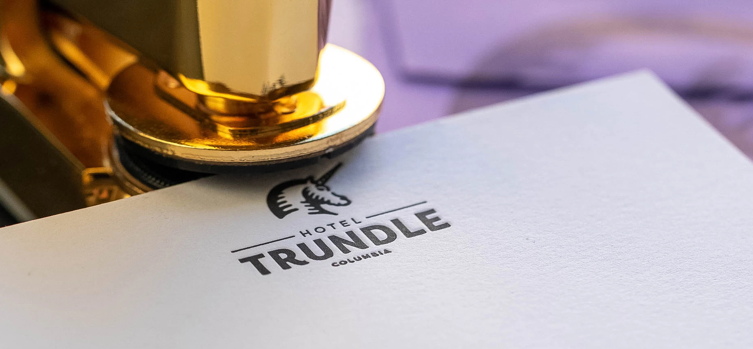 a close up of a piece of paper with trundle logo on it