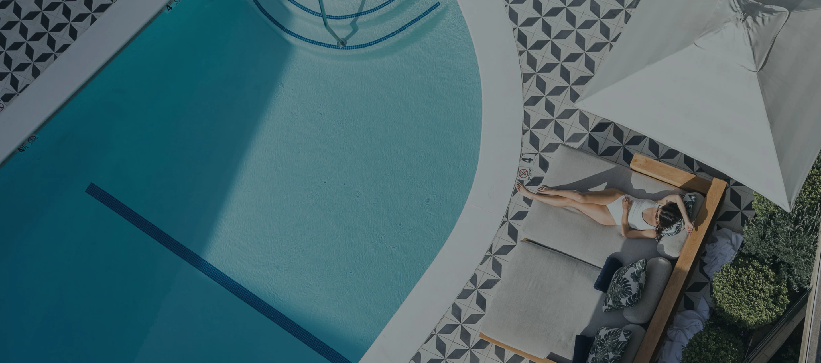 a woman sitting in a pool