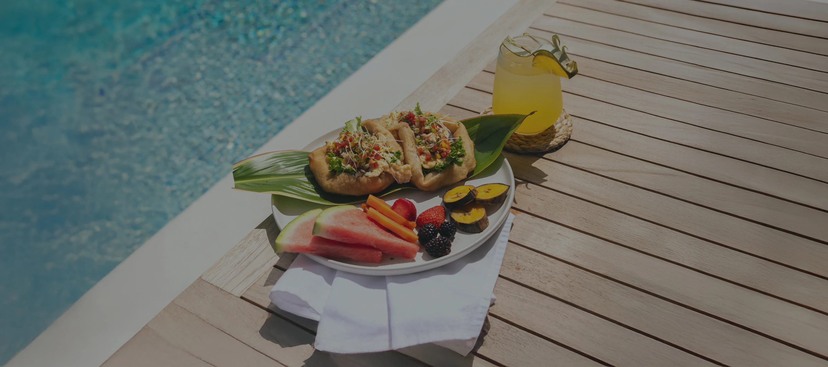 a plate of food next to a drink