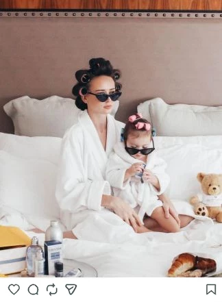 a woman and a child wearing sunglasses