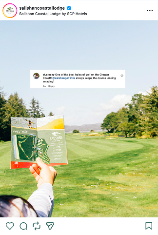 a hand holding a map in front of a golf course