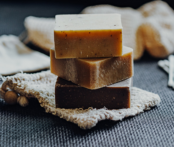 a stack of soaps on a cloth