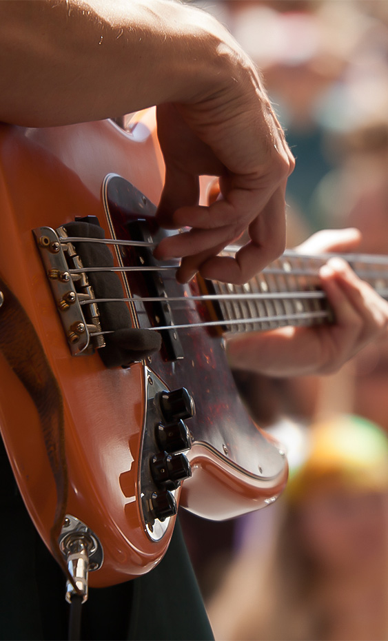 a person playing a guitar