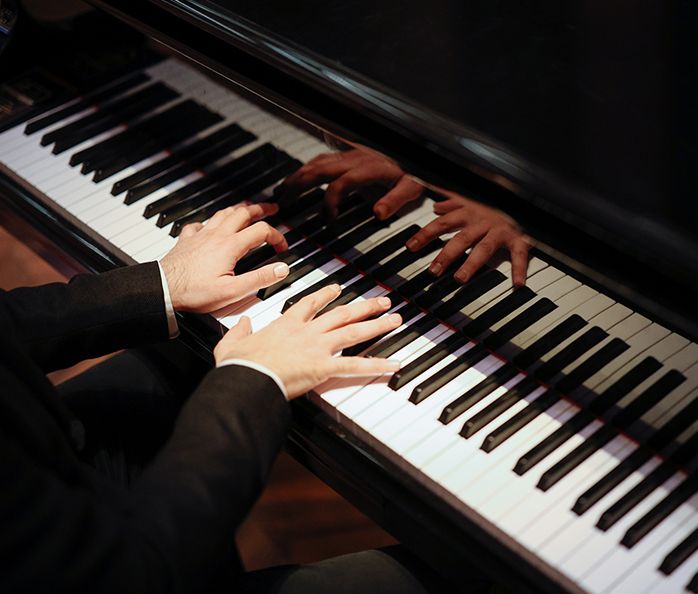 a person playing a piano