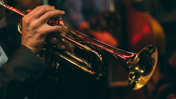 a person playing a trumpet