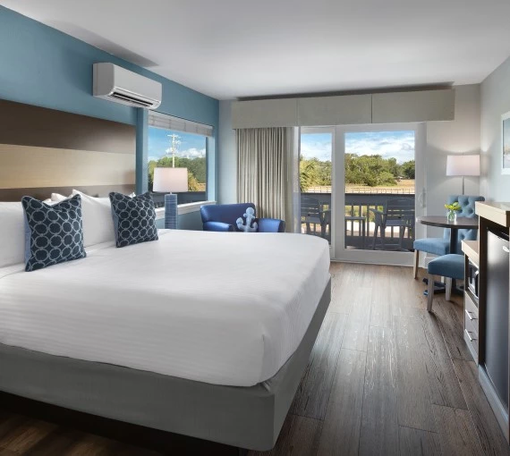 a room with a bed and a desk