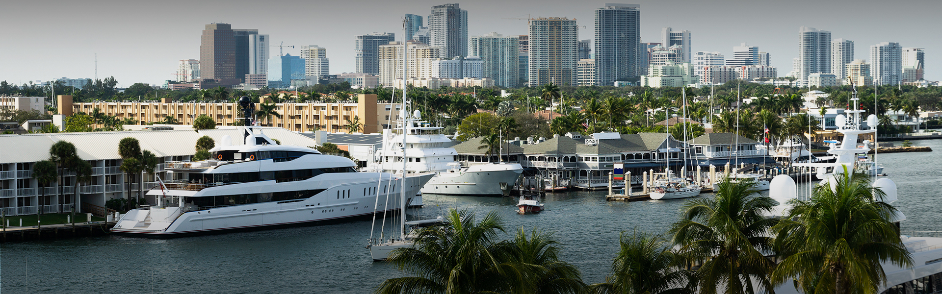 a group of boats in a harbor