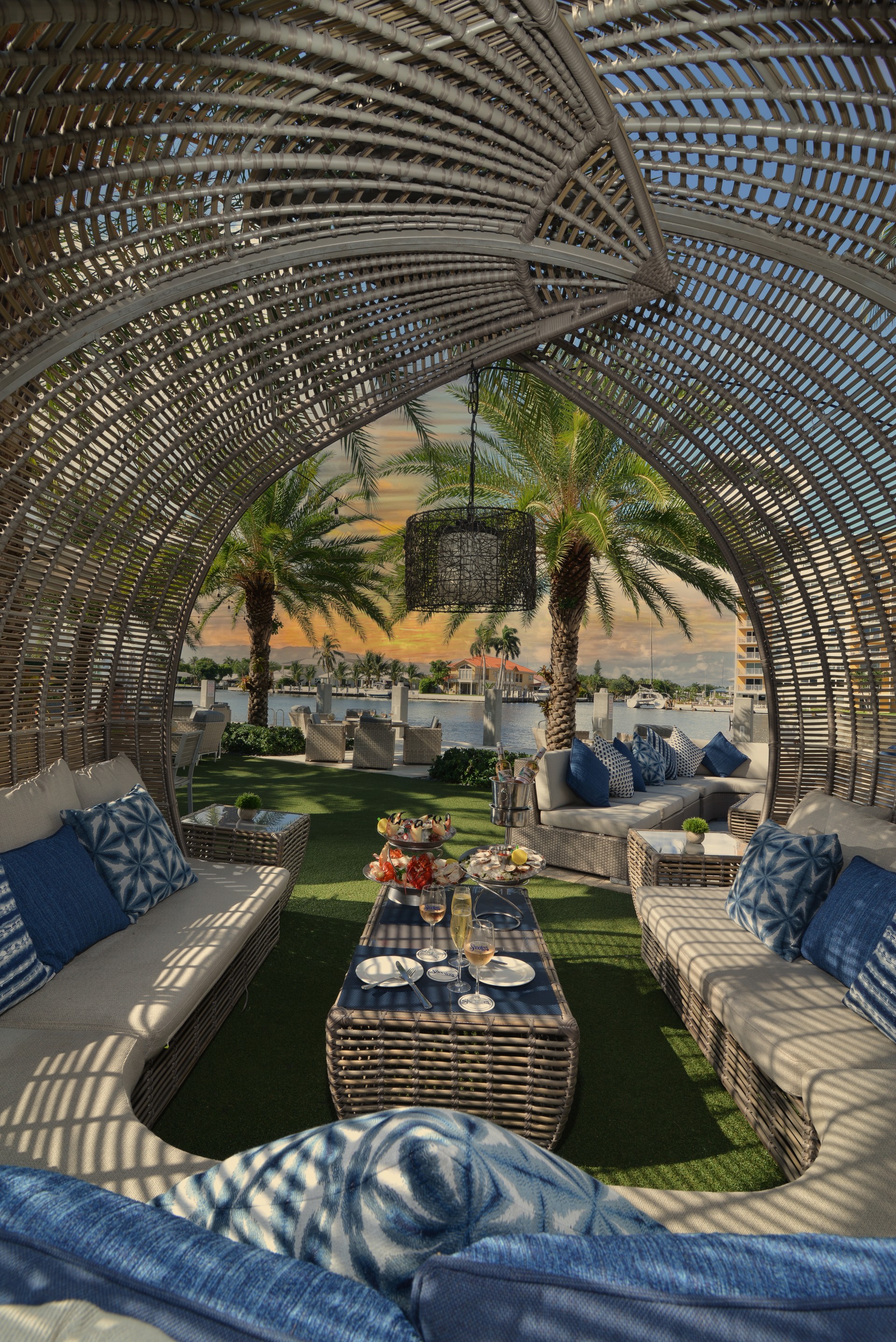 a patio area with a table and chairs