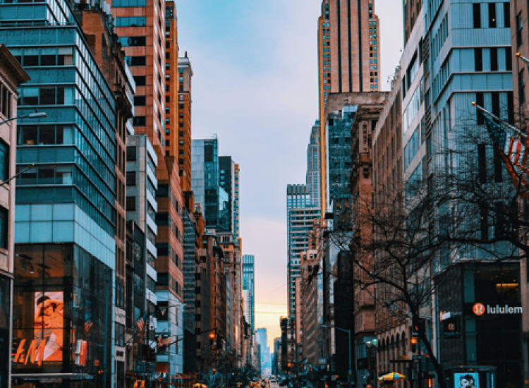 City streets and buildings with pedestrians walking