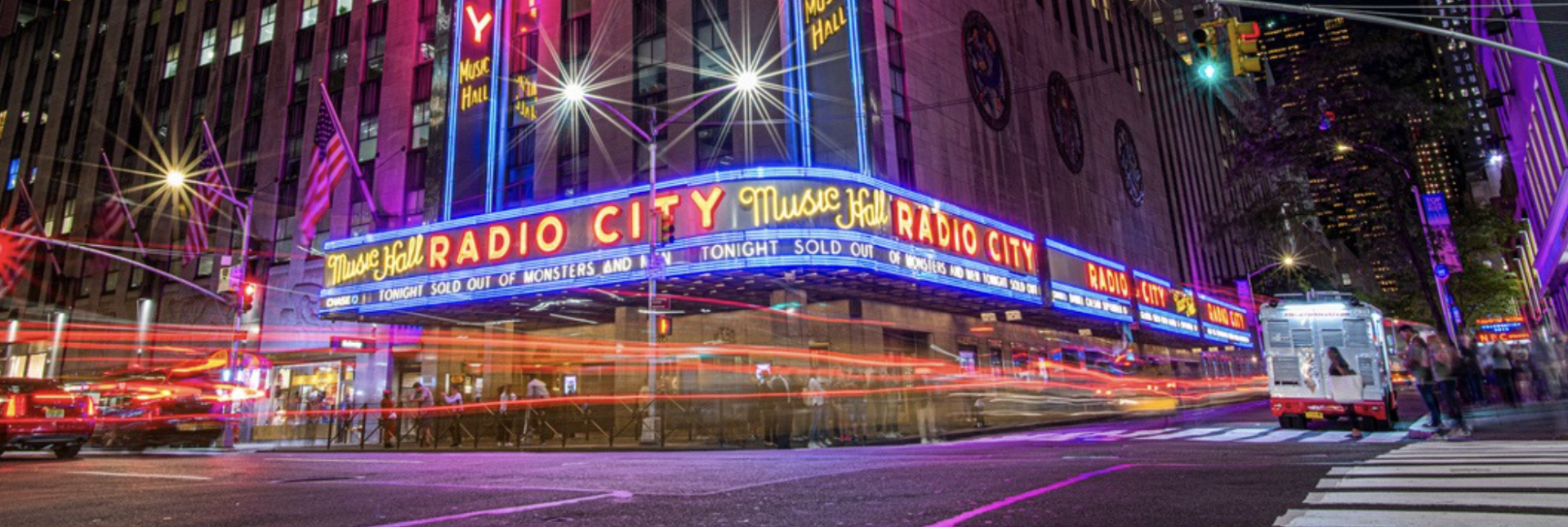 A nighttime view of Radio City Music Hall in New York City.