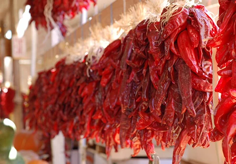 a group of red peppers from a wall