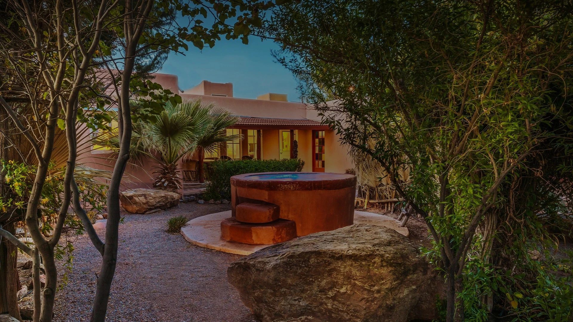 a stone fountain in a courtyard
