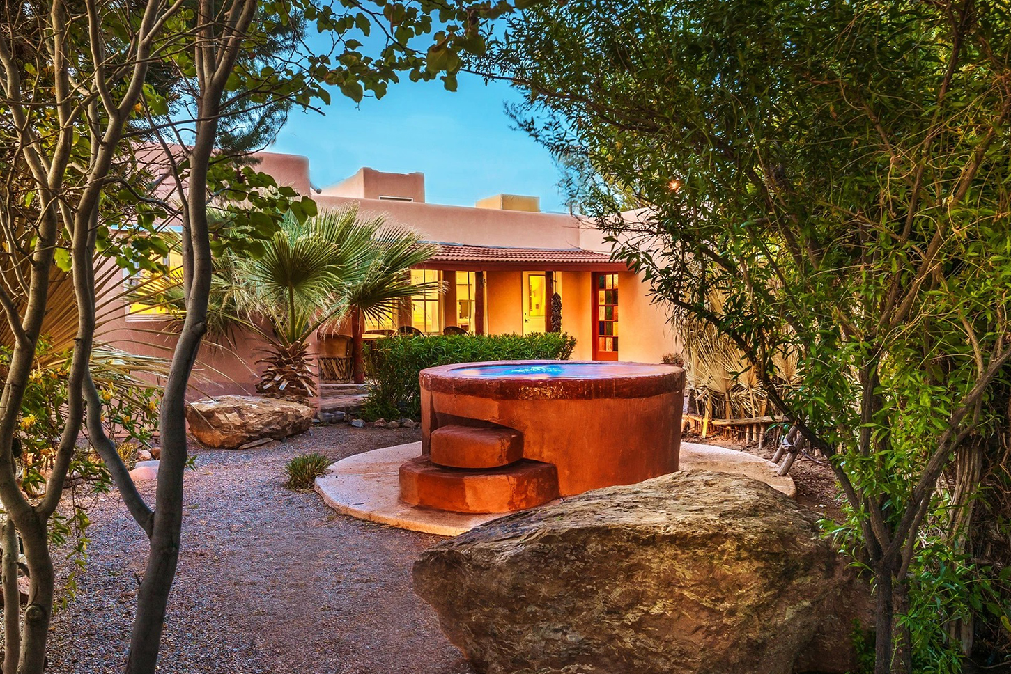 a stone fountain in a courtyard