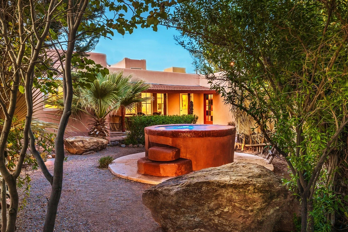a stone fountain in a courtyard