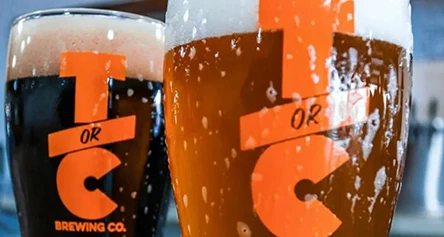 a close up of a glass of beer