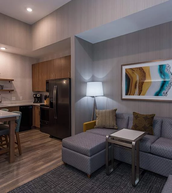 a living room with a couch and a table