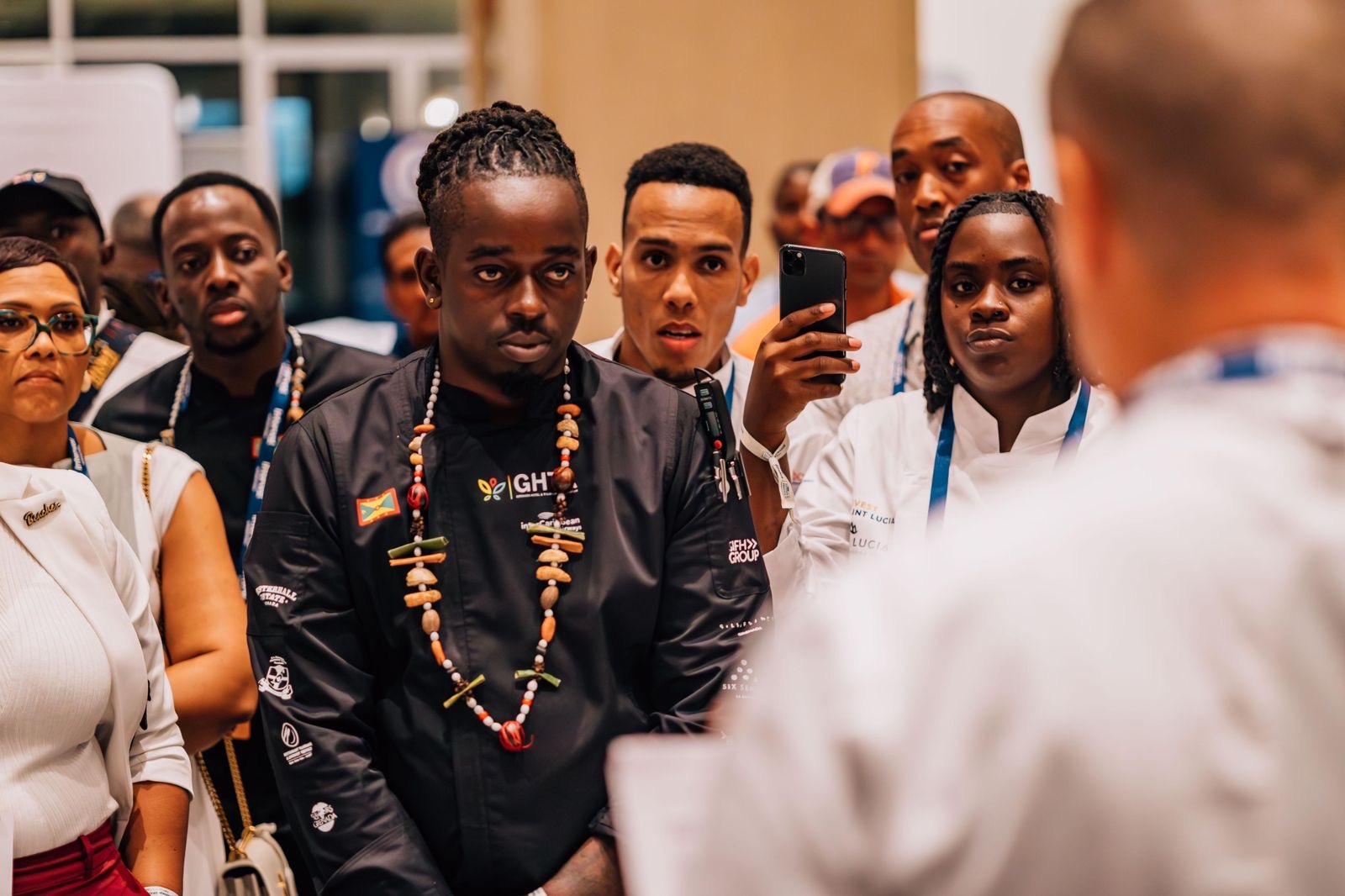 a group of people standing in a room